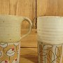 émaux beige et blanc
